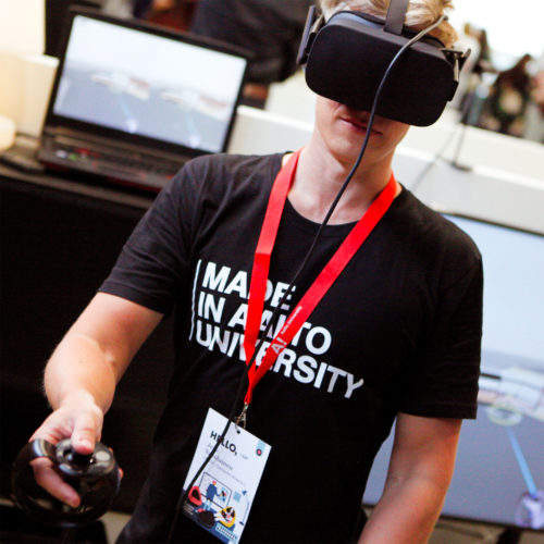 Front view of an Aalto University student using a VR headset.