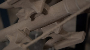 A close-up of a brown machinery structure.