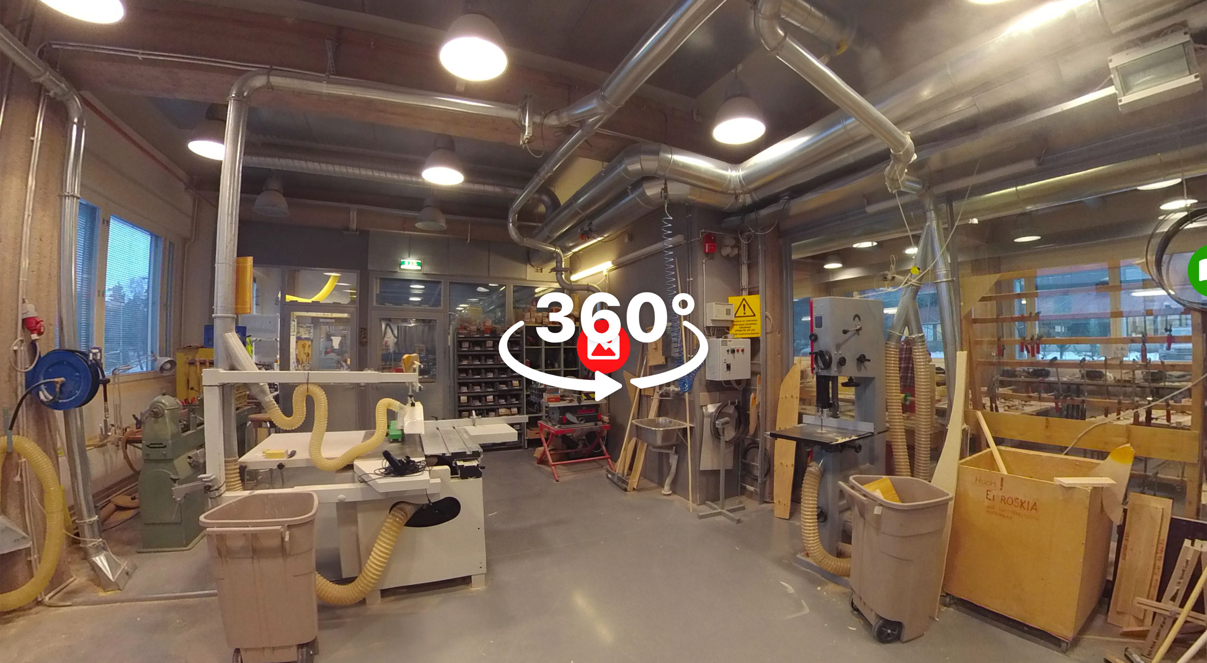A screenshot of 360 degree picture showcasing a workshop environment.